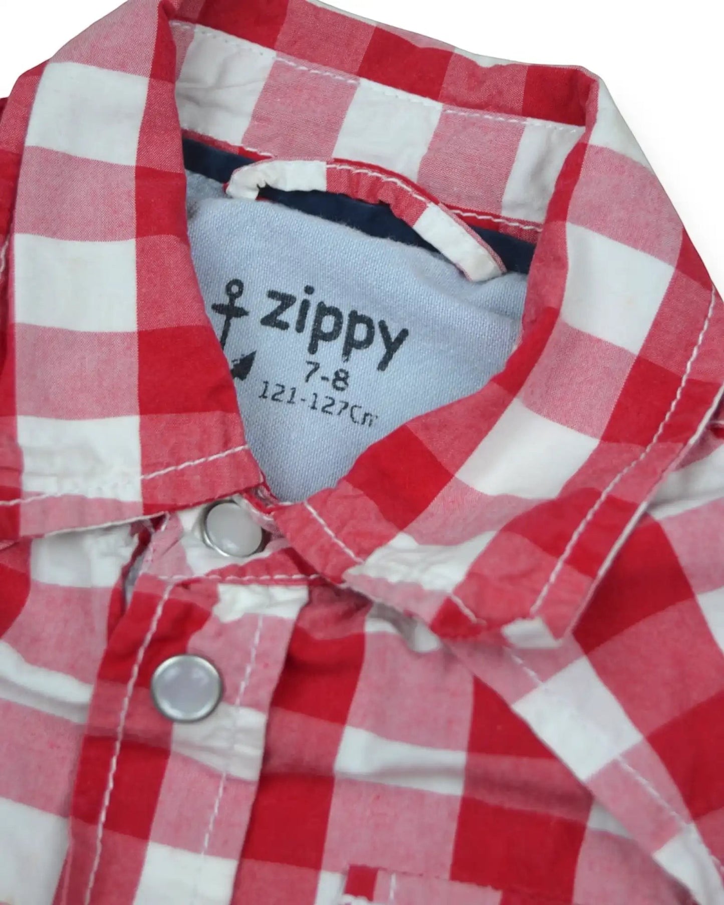 Camisa de criança Petit Fox Portugal da Zippy em algodão com padrão xadrez vermelho e branco e fechos de pressão
