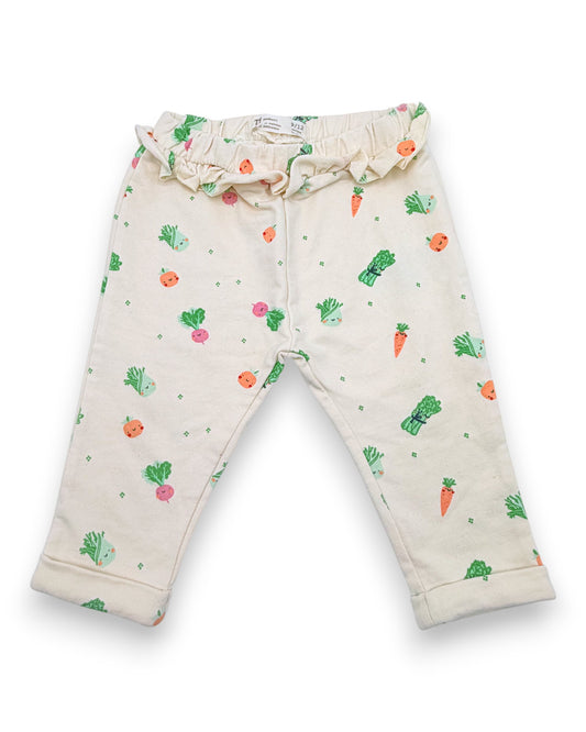 Calças Folhos 9-12 Meses