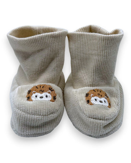 Beige booties, 0-1 month.