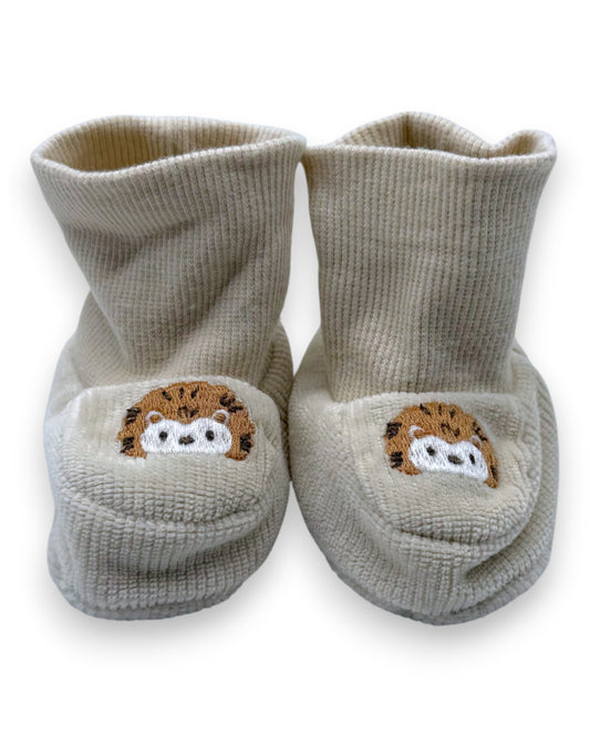 Beige booties, 0-1 month.